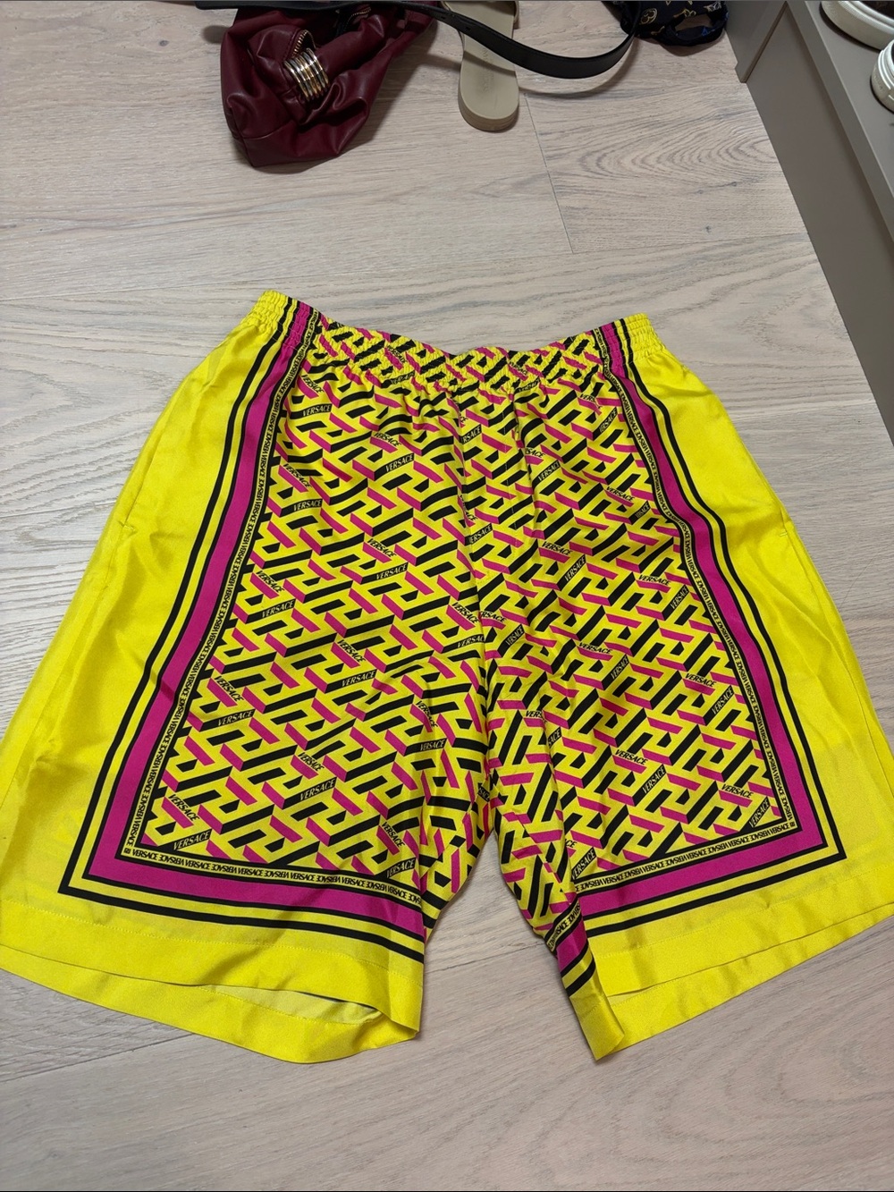 Versace Bright Yellow Printed Shorts with Pink & Black Pattern